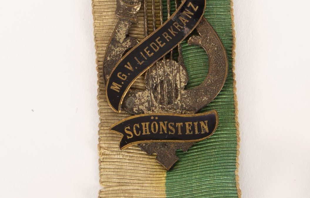 Znak Moškega pevskega zbora Liederkranz iz Šoštanja